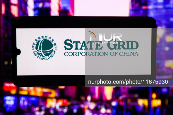 State Grid Corporation Of China logo is screened on a mobile phone for illustration photo. Krakow, Poland on October 17th, 2024. 