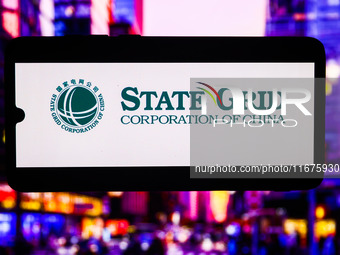 State Grid Corporation Of China logo is screened on a mobile phone for illustration photo. Krakow, Poland on October 17th, 2024. (