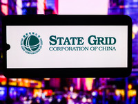 State Grid Corporation Of China logo is screened on a mobile phone for illustration photo. Krakow, Poland on October 17th, 2024. (