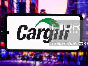 Cargill logo is screened on a mobile phone for illustration photo. Krakow, Poland on October 17th, 2024. (