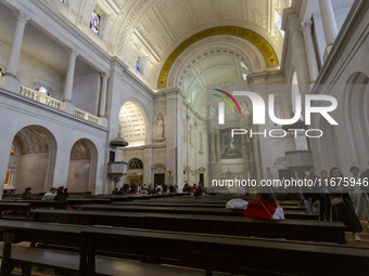 In Lisbon, Portugal, on October 17, 2024, a general view inside the Basilica of Fatima in Portugal shows Fatima becoming a pilgrimage destin...