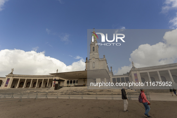 In Lisbon, Portugal, on October 17, 2024, people walk inside the Sanctuary of Fatima. Fatima becomes a pilgrimage destination for migrants,...