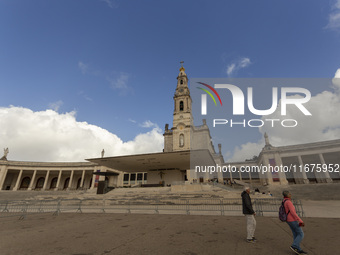 In Lisbon, Portugal, on October 17, 2024, people walk inside the Sanctuary of Fatima. Fatima becomes a pilgrimage destination for migrants,...