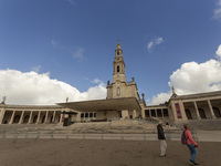 In Lisbon, Portugal, on October 17, 2024, people walk inside the Sanctuary of Fatima. Fatima becomes a pilgrimage destination for migrants,...