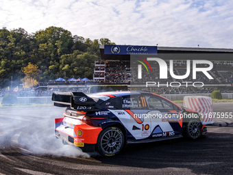 Driver Thierry Neuville and co-driver Martijn Wydaeghe of the Hyundai Shell Mobis World Rally Team, in a Hyundai I20 N Rally1 Hybrid, face t...