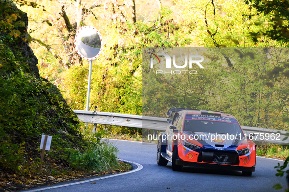 Driver Thierry Neuville and co-driver Martijn Wydaeghe of the Hyundai Shell Mobis World Rally Team, in a Hyundai I20 N Rally1 Hybrid, face t...