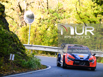 Driver Thierry Neuville and co-driver Martijn Wydaeghe of the Hyundai Shell Mobis World Rally Team, in a Hyundai I20 N Rally1 Hybrid, face t...