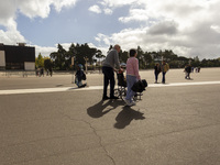 In Lisbon, Portugal, on October 17, 2024, a person walks on her knees near the chapel of the Sanctuary of Fatima. Fatima becomes a pilgrimag...