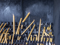 Candles light the interior of the Sanctuary of Fatima in Lisbon, Portugal, on October 17, 2024. Fatima becomes a pilgrimage destination for...