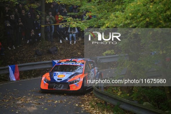 Driver Andreas Mikkelsen and co-driver Torstein Eriksen of the Hyundai Shell Mobis World Rally Team, in a Hyundai i20 N Rally1 Hybrid, face...