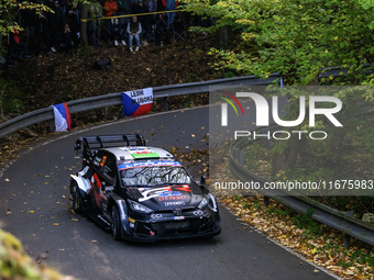 Driver Elfyn Evans and co-driver Scott Martin of the team Toyota Gazoo Racing WRT, in a Toyota GR Yaris Rally1 Hybrid, face the first day of...