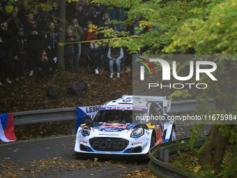 Driver Gregoire Munster and co-driver Louis Louka of the M-Sport Ford World Rally Team in a Ford Puma Rally1 Hybrid face the first day of th...