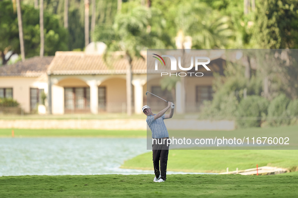 In San Roque, Spain, on October 17, 2024, Justin Harding of South Africa plays his second shot on the 14th hole on day one of the Estrella D...