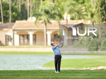 In San Roque, Spain, on October 17, 2024, Justin Harding of South Africa plays his second shot on the 14th hole on day one of the Estrella D...