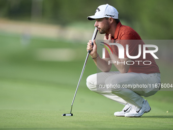 Frederic Lacroix of France studies his shot on the 14th green on day one of the Estrella Damm N.A. Andalucia Masters 2024 at Real Club de Go...