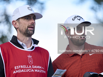 Frederic Lacroix of France studies his shot with his caddie on the 15th hole on day one of the Estrella Damm N.A. Andalucia Masters 2024 at...