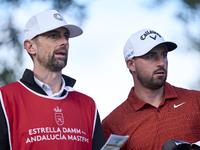 Frederic Lacroix of France studies his shot with his caddie on the 15th hole on day one of the Estrella Damm N.A. Andalucia Masters 2024 at...