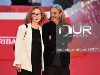 Carmen Giardina and Roberto Pischiutta attend the ''U.S. Palmese'' red carpet during the 19th Rome Film Festival at Auditorium Parco Della M...