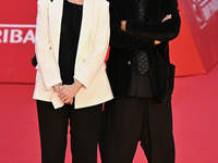 Carmen Giardina and Roberto Pischiutta attend the ''U.S. Palmese'' red carpet during the 19th Rome Film Festival at Auditorium Parco Della M...