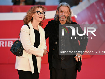 Carmen Giardina and Roberto Pischiutta attend the ''U.S. Palmese'' red carpet during the 19th Rome Film Festival at Auditorium Parco Della M...