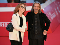 Carmen Giardina and Roberto Pischiutta attend the ''U.S. Palmese'' red carpet during the 19th Rome Film Festival at Auditorium Parco Della M...