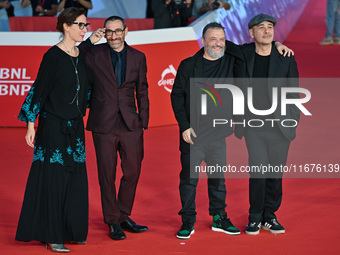 (L-R) A guest, Antonio Manetti, Marco Manetti, and a guest attend the ''U.S. Palmese'' red carpet during the 19th Rome Film Festival at Audi...