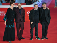 (L-R) A guest, Antonio Manetti, Marco Manetti, and a guest attend the ''U.S. Palmese'' red carpet during the 19th Rome Film Festival at Audi...