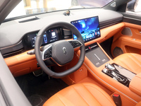 A smart car with Harmony OS autonomous driving technology is seen at Huawei's flagship store in Shanghai, China, on October 15, 2024. (