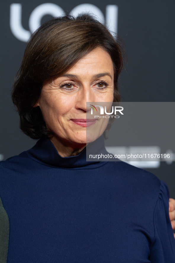 Sandra Maischberger, a German talk show host, stands on the red carpet during the opening of the Cologne Film Festival 2024 at Film Palast i...