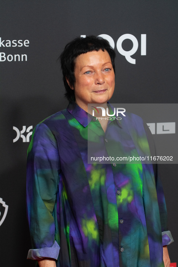 Martina Richter, the director of the Cologne Film Festival, stands on the red carpet during the opening of the Cologne Film Festival 2024 at...