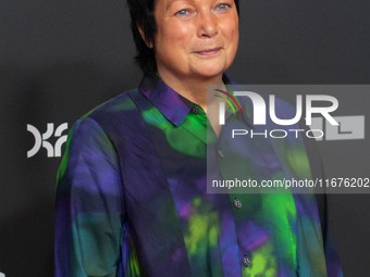 Martina Richter, the director of the Cologne Film Festival, stands on the red carpet during the opening of the Cologne Film Festival 2024 at...