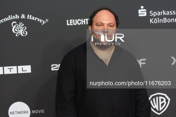 Marshall, a German actor, stands on the red carpet during the opening of the Cologne Film Festival 2024 at Film Palast in Cologne, Germany,...