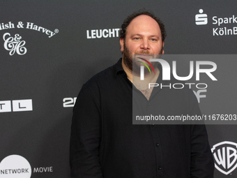 Marshall, a German actor, stands on the red carpet during the opening of the Cologne Film Festival 2024 at Film Palast in Cologne, Germany,...