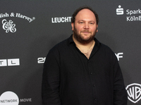 Marshall, a German actor, stands on the red carpet during the opening of the Cologne Film Festival 2024 at Film Palast in Cologne, Germany,...