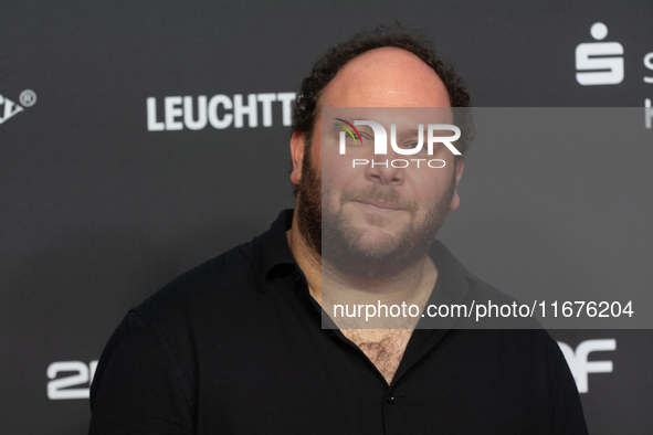 Marshall, a German actor, stands on the red carpet during the opening of the Cologne Film Festival 2024 at Film Palast in Cologne, Germany,...