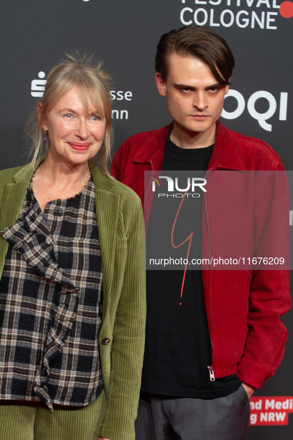 Therese Hamer, a German actress, and Joscha Baltha, a German actor, stand on the red carpet during the opening of the Cologne Film Festival...