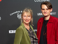 Therese Hamer, a German actress, and Joscha Baltha, a German actor, stand on the red carpet during the opening of the Cologne Film Festival...