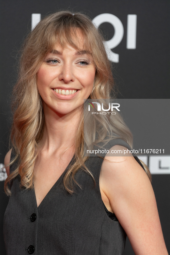 Ricarda Richter, a German actress, stands on the red carpet during the opening of the Cologne Film Festival 2024 at Film Palast in Cologne,...