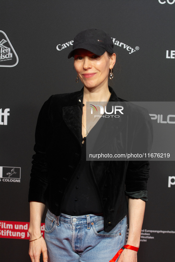 Antonia Bergman, a German actress, stands on the red carpet during the opening of the Cologne Film Festival 2024 at Film Palast in Cologne,...