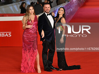 Beatrice Nardi, Antonello Lauretti, and Giulia Acri attend the ''Paradiso in vendita'' red carpet during the 19th Rome Film Festival at Audi...