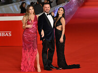 Beatrice Nardi, Antonello Lauretti, and Giulia Acri attend the ''Paradiso in vendita'' red carpet during the 19th Rome Film Festival at Audi...