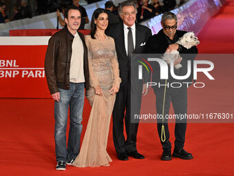 (L - R) Bruno Todeschini, Donatella Finocchiaro, Luca Barbareschi, and Guillermo Mariotto attend the ''Paradiso in vendita'' red carpet duri...