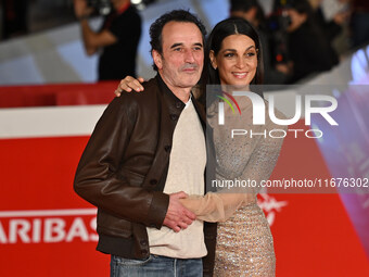 Bruno Todeschini and Donatella Finocchiaro attend the ''Paradiso in vendita'' red carpet during the 19th Rome Film Festival at Auditorium Pa...