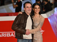 Bruno Todeschini and Donatella Finocchiaro attend the ''Paradiso in vendita'' red carpet during the 19th Rome Film Festival at Auditorium Pa...