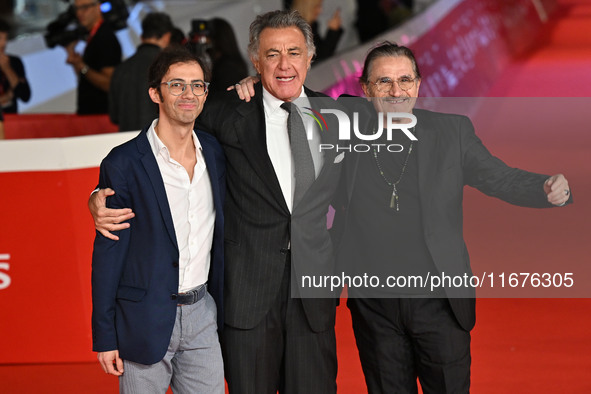 Luca Barbareschi and a guest attend the ''Paradiso in vendita'' red carpet during the 19th Rome Film Festival at Auditorium Parco Della Musi...