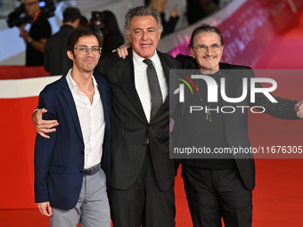 Luca Barbareschi and a guest attend the ''Paradiso in vendita'' red carpet during the 19th Rome Film Festival at Auditorium Parco Della Musi...