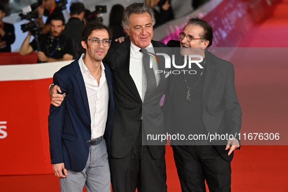 Luca Barbareschi and a guest attend the ''Paradiso in vendita'' red carpet during the 19th Rome Film Festival at Auditorium Parco Della Musi...