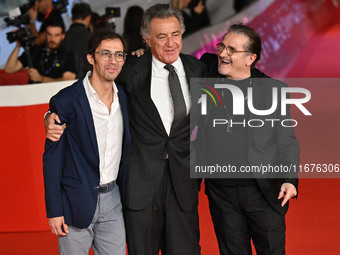 Luca Barbareschi and a guest attend the ''Paradiso in vendita'' red carpet during the 19th Rome Film Festival at Auditorium Parco Della Musi...