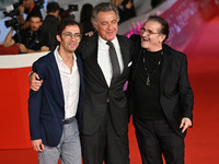 Luca Barbareschi and a guest attend the ''Paradiso in vendita'' red carpet during the 19th Rome Film Festival at Auditorium Parco Della Musi...