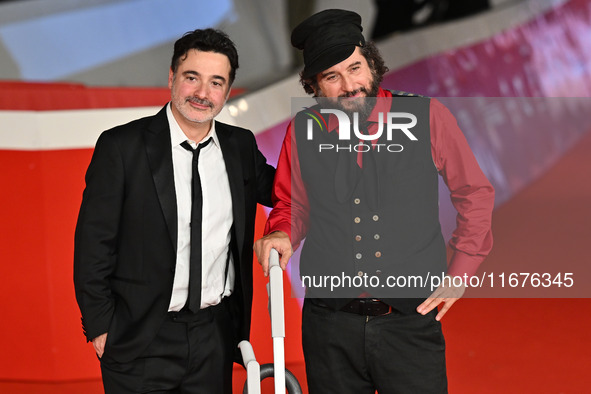 Gianfranco Firriolo and Vinicio Capossela attend the ''Natale fuori orario'' red carpet during the 19th Rome Film Festival at Auditorium Par...